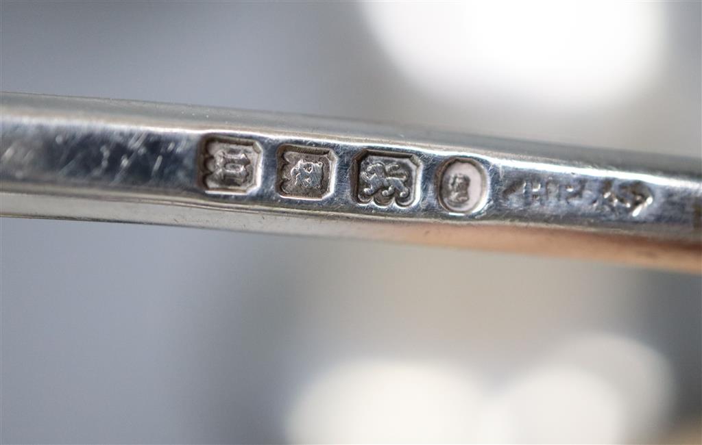 A silver Christening mug, a pair of silver seal top spoons and sundry silver,